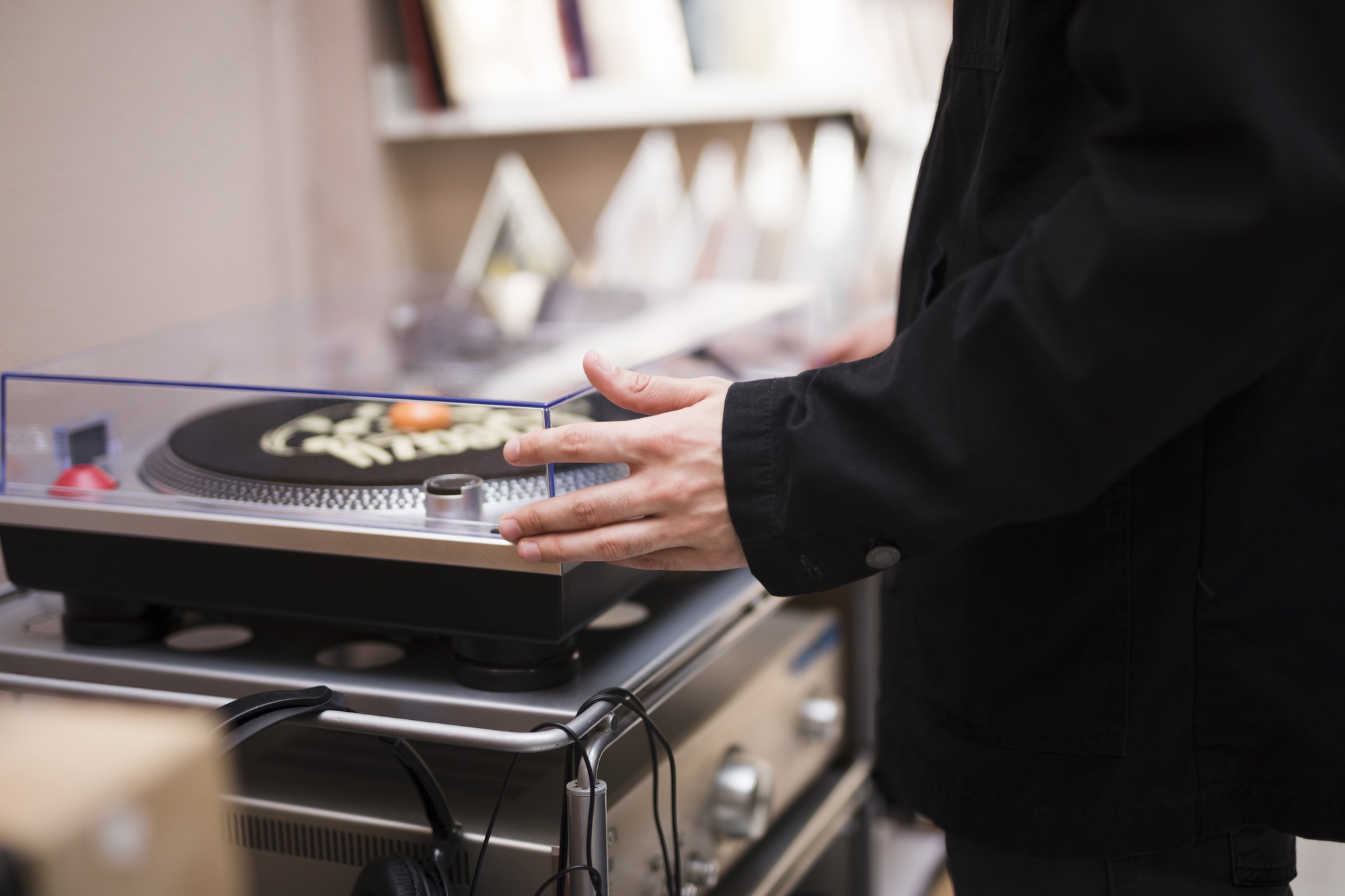 chef calibrating a digital scale in a professional kitchen